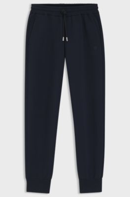 Relaxed-fit cotton-blend cuffed tracksuit bottoms, Dark Blue