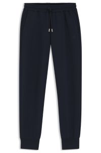 Relaxed-fit cotton-blend cuffed tracksuit bottoms, Dark Blue