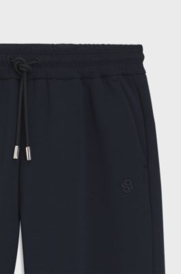 Relaxed-fit cotton-blend cuffed tracksuit bottoms, Dark Blue