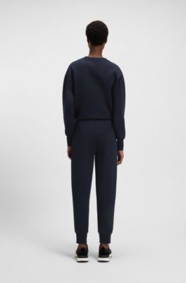 Pantaloni della tuta relaxed fit in misto cotone con fondo gamba elastico, Blu scuro