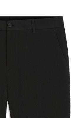 Tapered-fit trousers in stretch-cotton seersucker, Black
