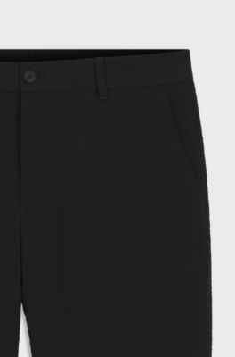 Tapered-fit trousers in stretch-cotton seersucker, Black