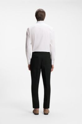 Tapered-fit trousers in stretch-cotton seersucker, Black