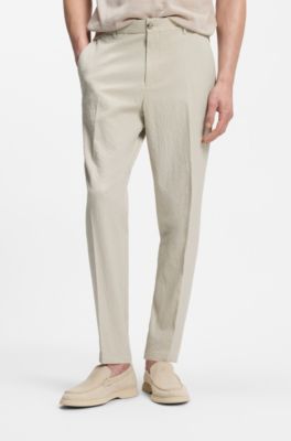 Tapered-fit trousers in stretch-cotton seersucker, Light Beige