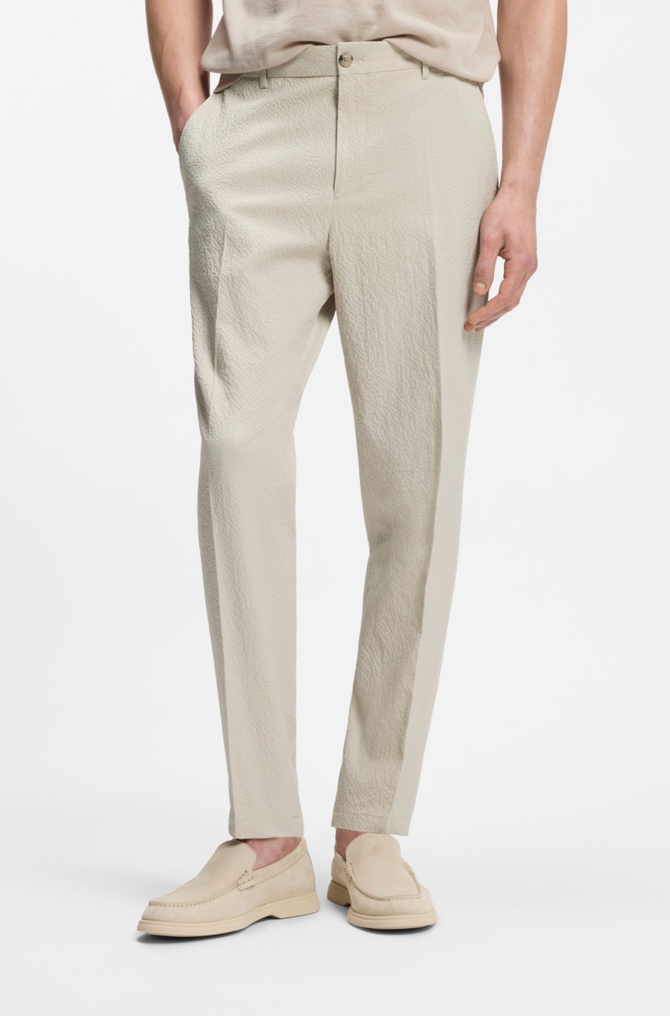 Tapered-fit trousers in stretch-cotton seersucker