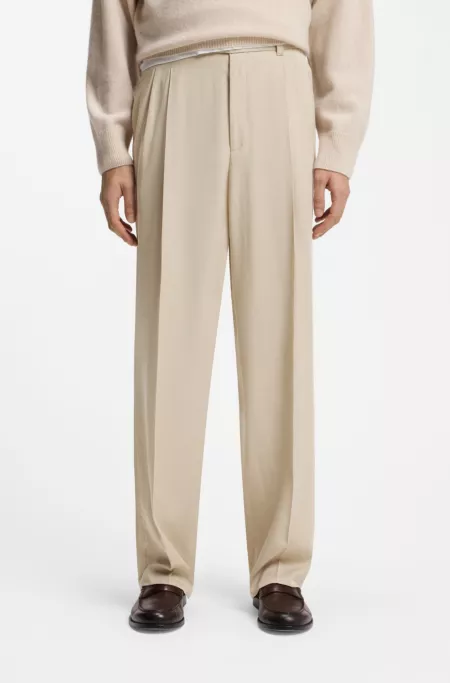 Oversized-fit trousers in draped twill
