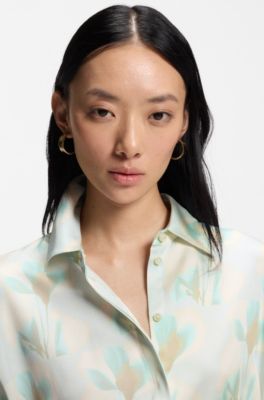 Blusa relaxed fit con estampado de flores, Fantas&iacute;a