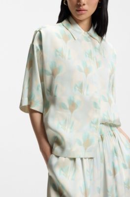 Blusa relaxed fit con estampado de flores, Fantas&iacute;a