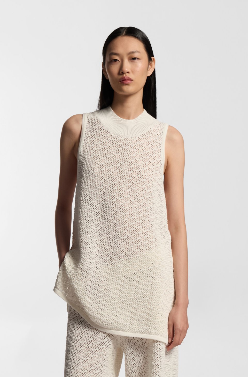 Knitted cotton top with micro-lace structure