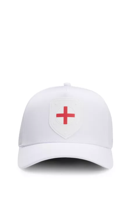 Logo cap in lustrous twill with country-flag badge
