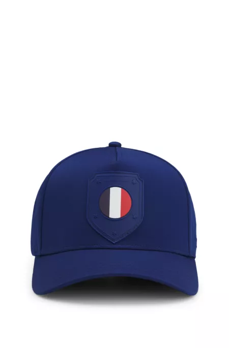 Logo cap in lustrous twill with country-flag badge