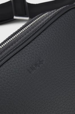 Crossbody bag in grained leather with embossed logo, Black