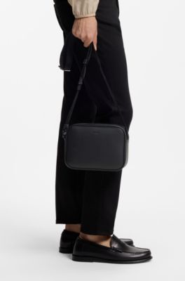 Crossbody bag in grained leather with embossed logo, Black