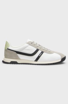 Sneakers med logga och detaljer i mocka, Ljusgr&aring;