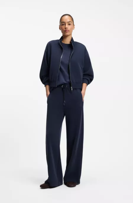 Relaxed-fit tracksuit bottoms with piping details
