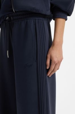 Relaxed-fit tracksuit bottoms with piping details, Dark Blue