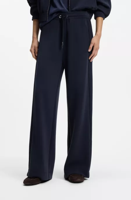 Relaxed-fit tracksuit bottoms with piping details