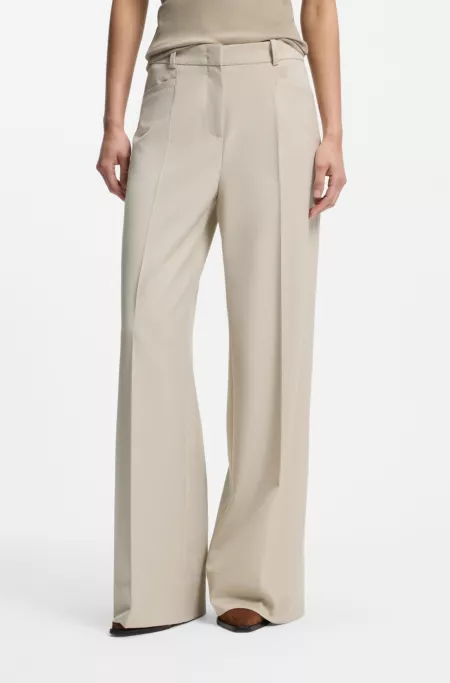 Pantalones regular fit con pernera ancha