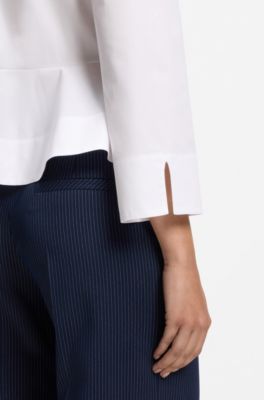 Slim-fit blouse in cotton with peplum hem, White