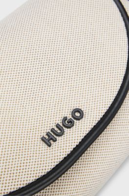 Umh&auml;ngetasche aus Canvas mit Bes&auml;tzen in Leder-Optik, Natur