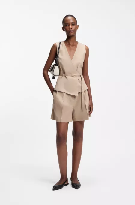 Bolso bandolera de lona con apliques de piel sintética