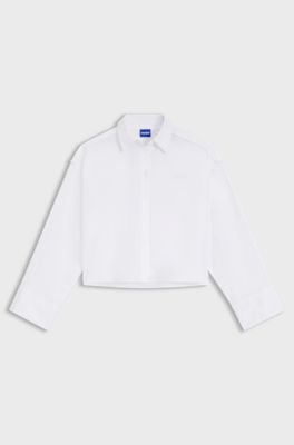 Oversize pinstriped cotton shirt with open cut hem, White