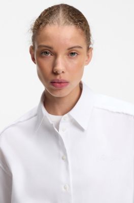 Oversize pinstriped cotton shirt with open cut hem, White