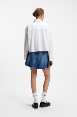 Oversize pinstriped cotton shirt with open cut hem, White