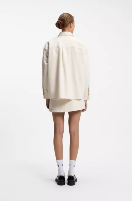 Blusa oversize fit en sarga de algodón