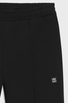 Pantaloni della tuta relaxed fit in misto cotone strutturato, Nero