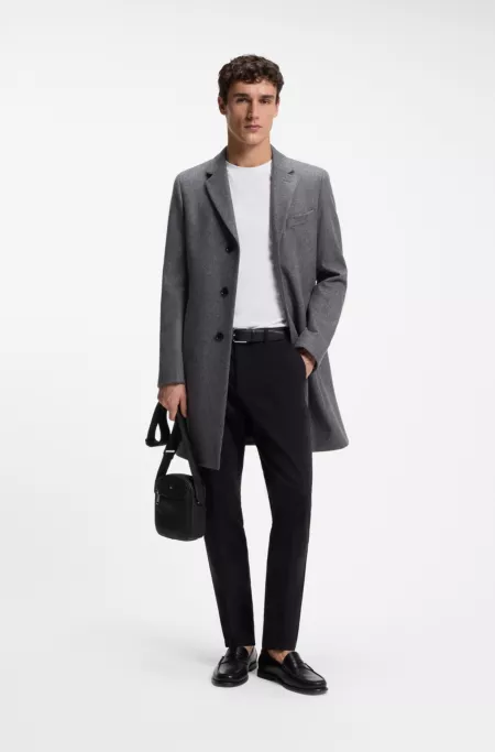 Reporter bag with monogram details