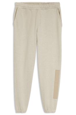 Hugo Relaxed-fit tracksuit bottoms in cotton with logo trim badbyxor herr – bild 4