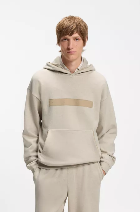 Relaxed-fit cotton-terry hoodie with wide-set logo