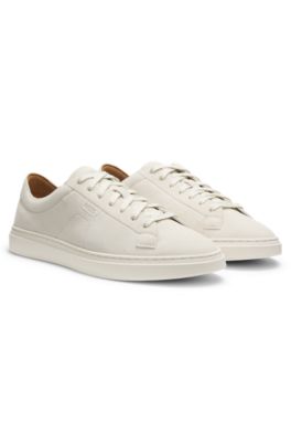 Suede trainers with embossed logo, White