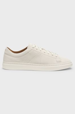 Suede trainers with embossed logo, White