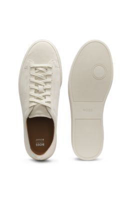 Suede trainers with embossed logo, White