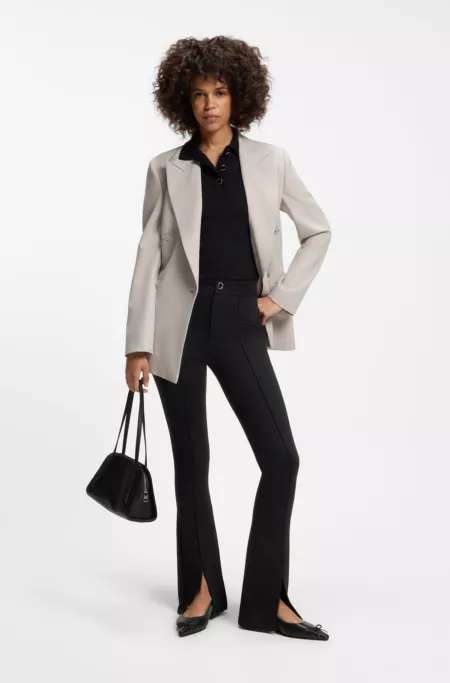 Flared-fit trousers with front slits