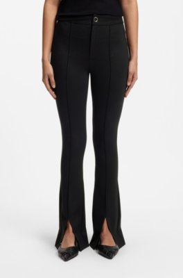 Flared-fit trousers with front slits