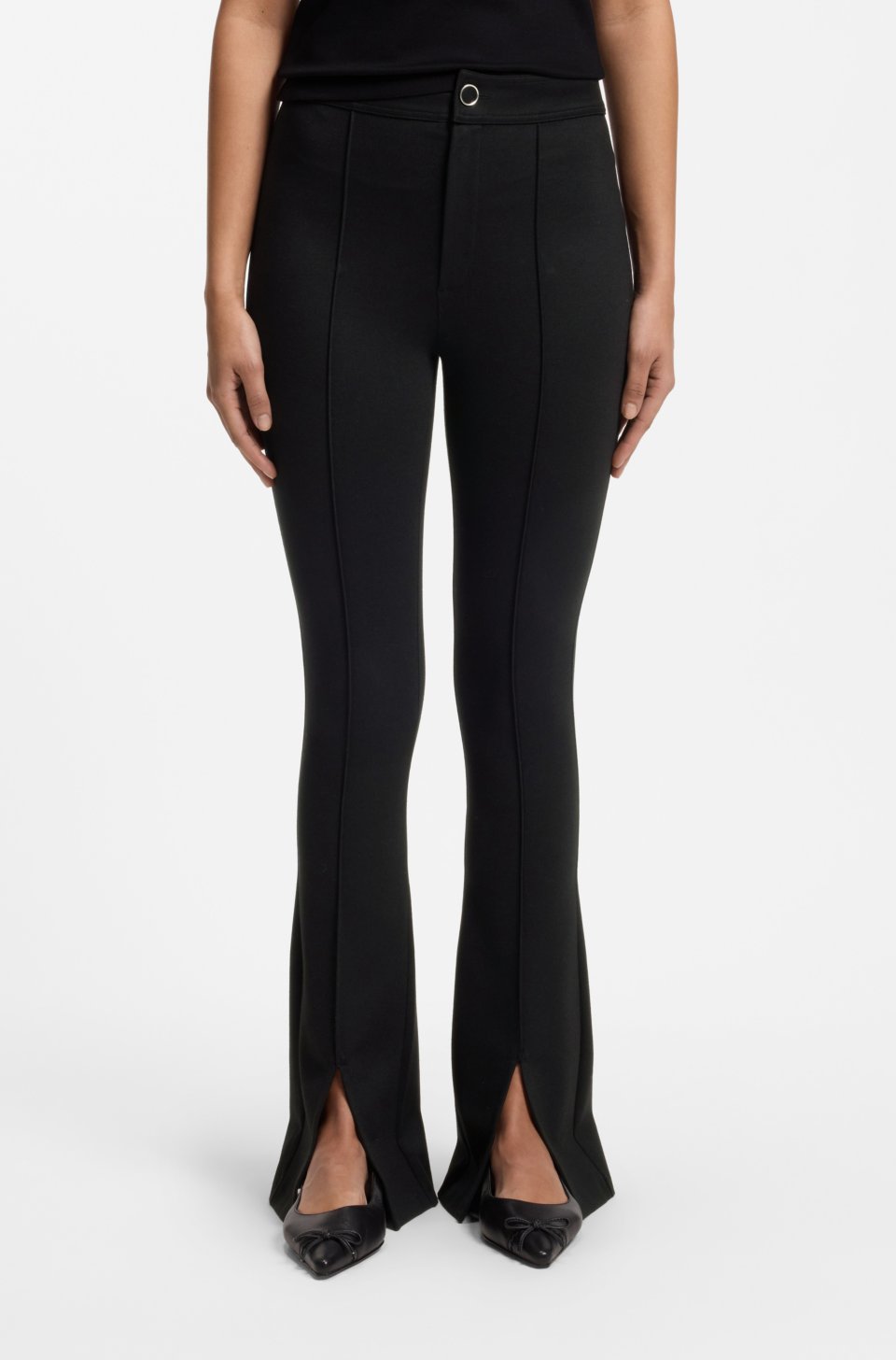 Flared-fit trousers with front slits