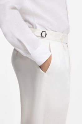 Pantaloni relaxed fit in lino con pieghe sulla parte anteriore, Bianco