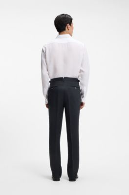 Pantalon coupe d&eacute;contract&eacute;e en lin avec plis sur le devant, Bleu fonc&eacute;