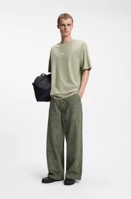 Pantalones baggy fit de lona de algodón con estampado de serpiente