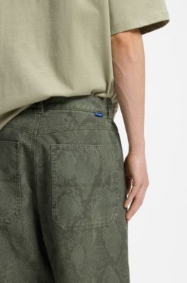 Pantaloni baggy fit in tela di cotone con stampa serpente, Verde scuro