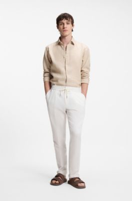 Mules en faux cuir su&eacute;d&eacute; avec d&eacute;tails de logo, Marron