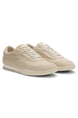 Suede-leather trainers with whipstitching