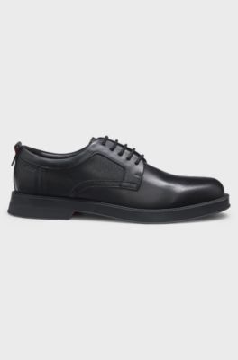 Derby shoes in leather with perforated monograms, Black