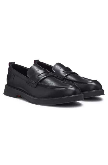 Leather loafers with perforated logos