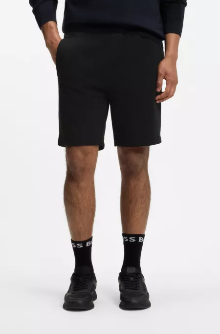 Logo-embroidered shorts in cotton-blend piqué jersey