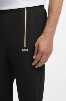 Active tracksuit bottoms in thermoregulating stretch gabardine, Black