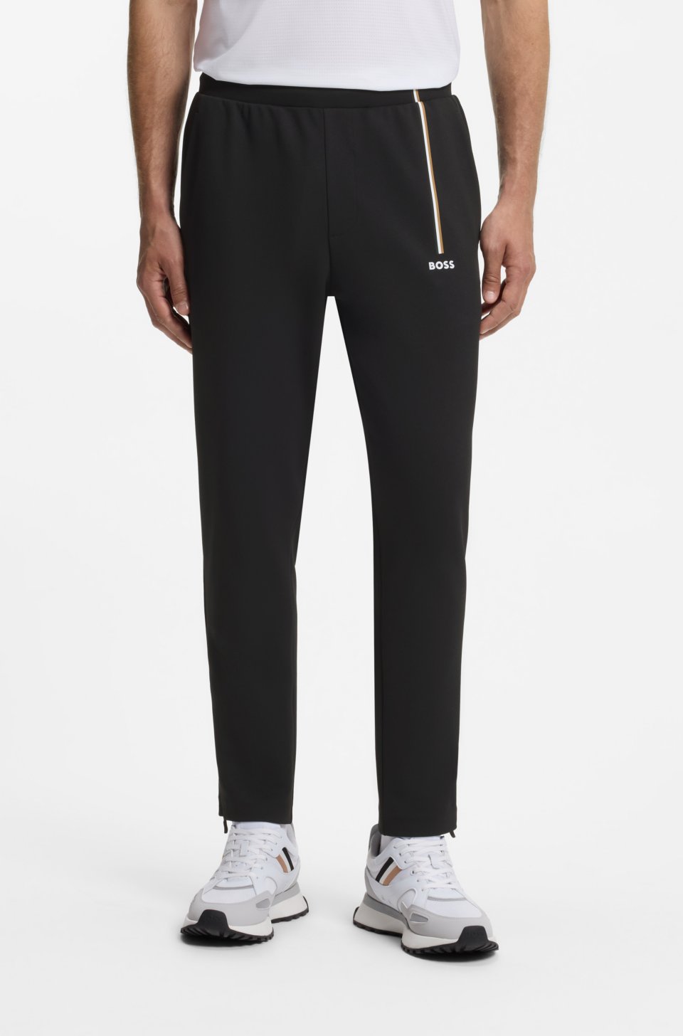 Active tracksuit bottoms in thermoregulating stretch gabardine